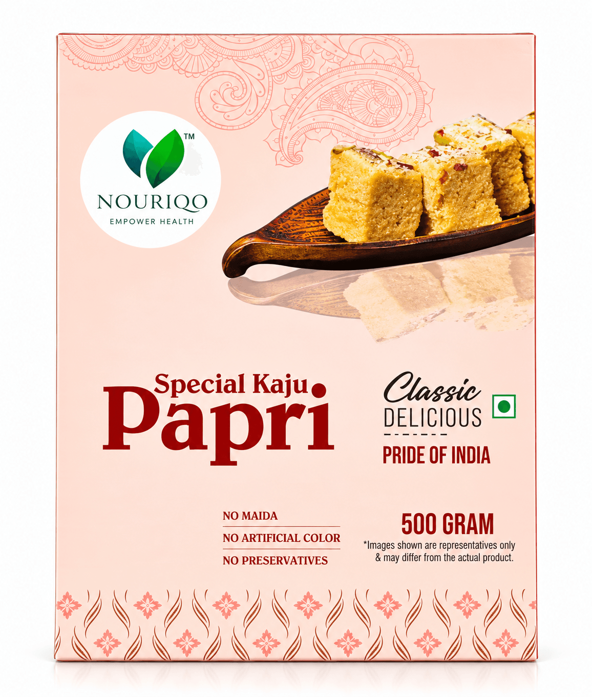 Nouriqo Kaju Papri box with cashew papri sweets served on a wooden tray